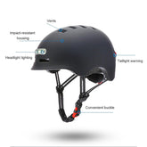 Black electric scooter helmet with labeled features on a white background
